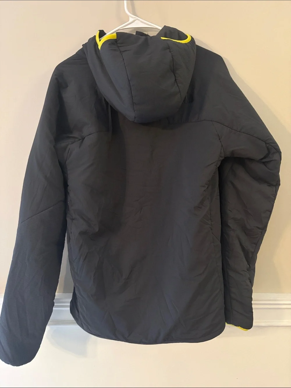 The North Face Men’s Black Jacket with Yellow Trim Hood